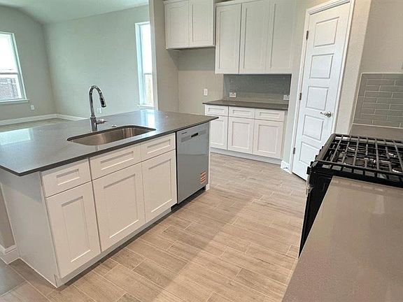 Kitchen - All Home and community information, including pricing, included features, terms, availability and amenities, are subject to change at any time without notice or obligation. All Drawings, pictures, photographs, video, square footages, floor plans, elevations, features, colors and sizes are approximate for illustration purposes only and will vary from the homes as built.