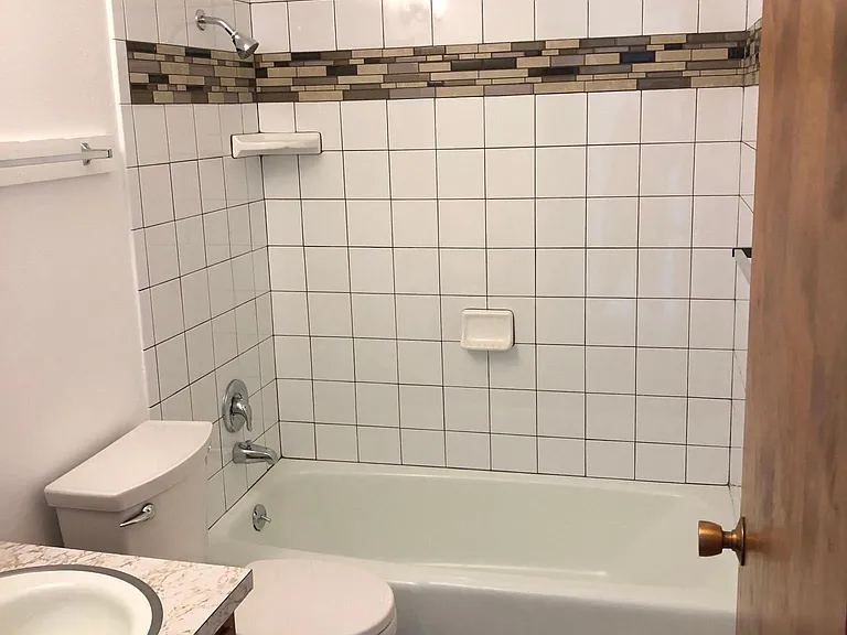 New tile floor and toilet