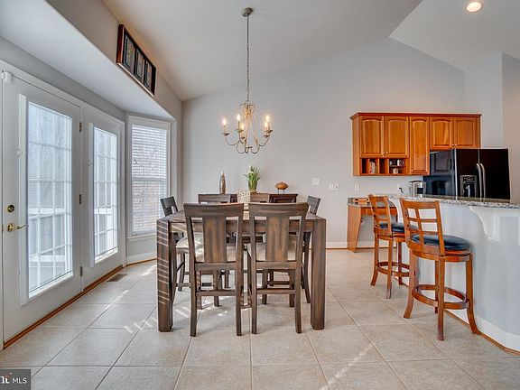 Breakfast Area: Bow Windows & French Doors