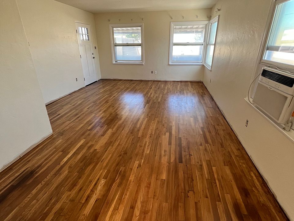 Living Room facing front door/front balcony