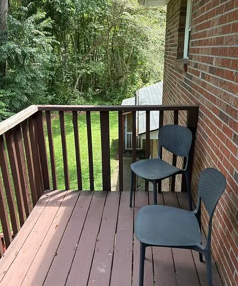Private Deck overlooking wooded area.