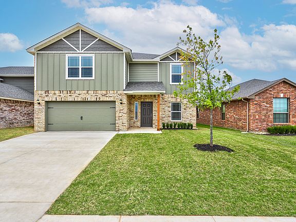 This gorgeous home offers five bedrooms and a host of included upgrades