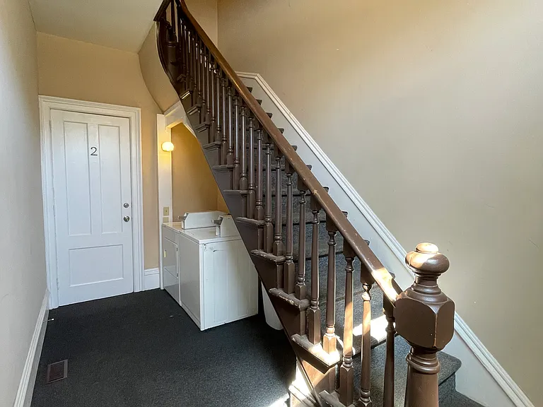 604 W. Gray Street- Foyer & Laundry Center