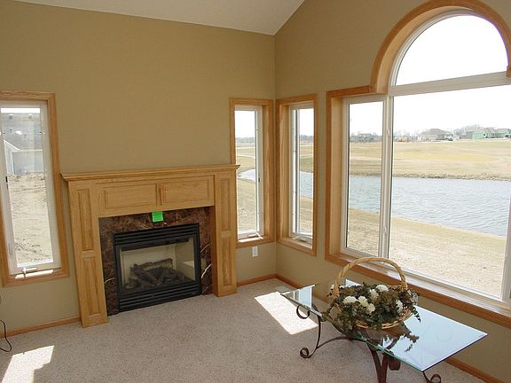 Sunroom with cozy fireplace 