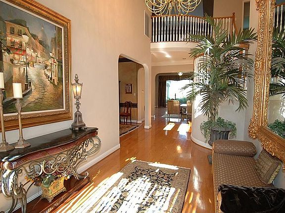  THE FOYER LEADS FLOWS INTO THE DINING ROOM AND LIVING ROOM!