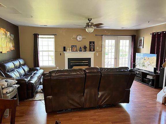 Living room with lots of natural light, wifi controlled ceiling lights.