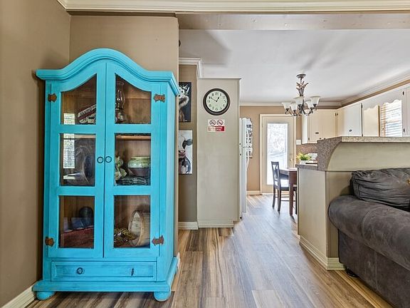 This cabinet is hand painted with chalk paint and decorated.