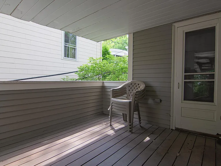 Rear balcony accessed from living room or kitchen