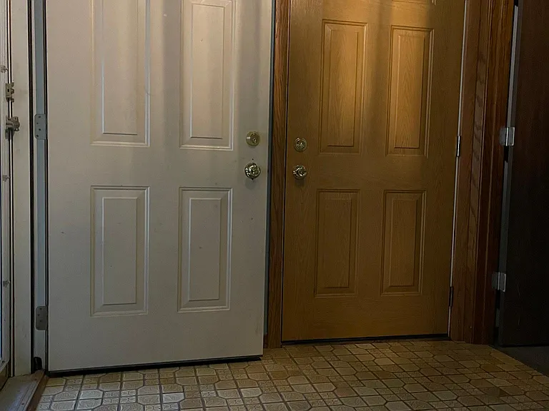 Foyer and door to garage