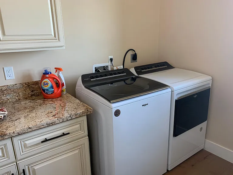 Laundry room with new state of the art washer/ dryer