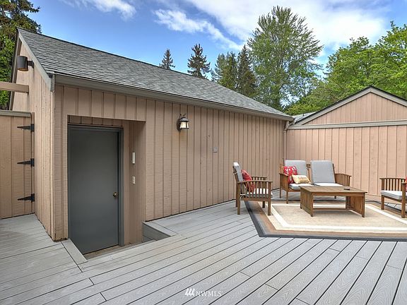 Pictured here, access to your own two car garage offering tons of loft storage with pull down ladder.  This shot captures the excess space ready for you to furnish!