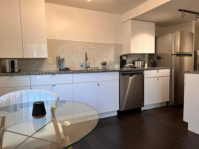 Living room into kitchen view.