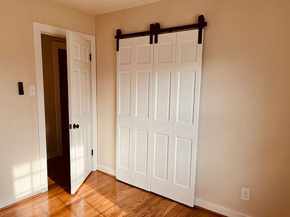 This is the smallest of the three bedrooms with a double closet. Perfect for a baby's room or an office.