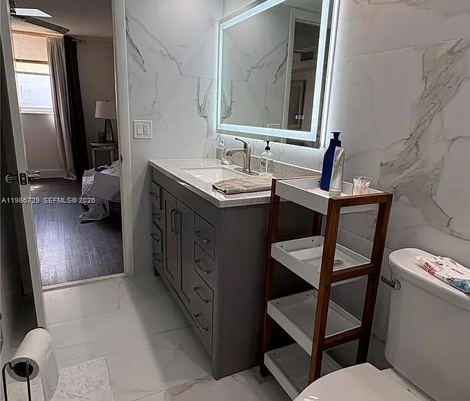 299 NW 52nd Ter #X — Photo 16