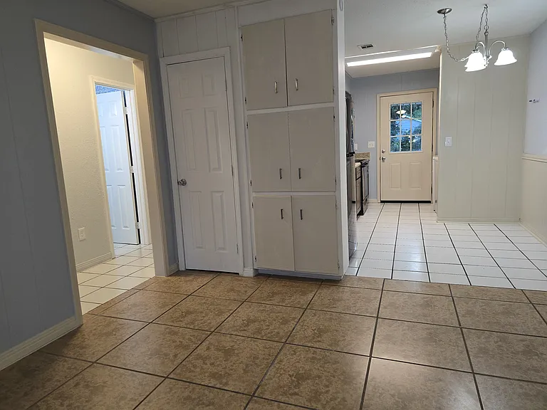 The open floor plan and light walls are inviting and fresh!