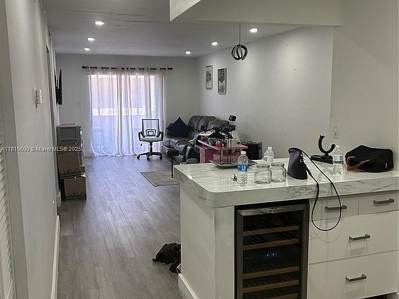 5th image of 6095 W 19th Ave APT 209