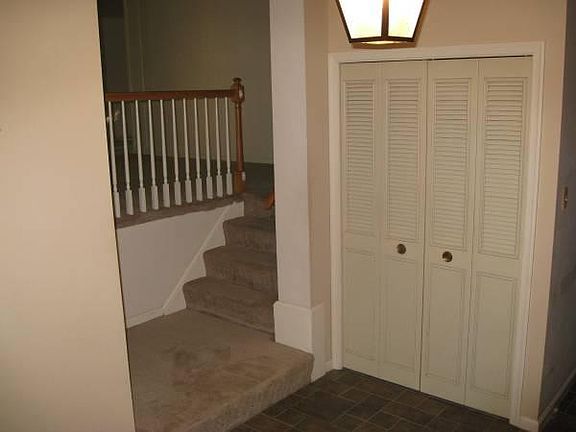 Front entrance. Left to living room/dining room/kitchen and right to family room.