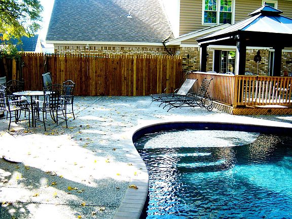 Back deck, gazebo and pool decking perfect for entertaining.
