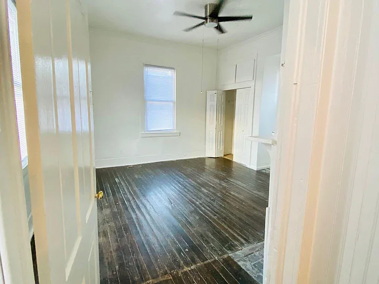 Master bedroom: high ceilings with ceiling fan, great natural light from windows on 3 sides