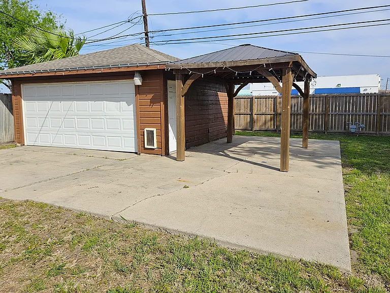 Large detached garage and gazebo, excellent for storage