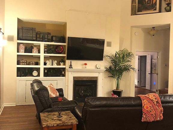 Living room with vaulted ceilings