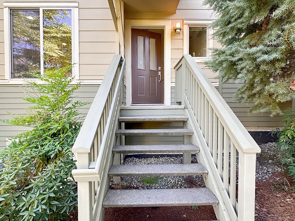 Welcome home to Ascent at Talus! Your main level entry faces a lovely front yard that is maintained by the HOA. Green space separates your front door from the main road, giving additional safety and quiet.