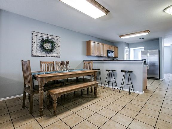 Awesome dining room with open concept makes it fun to have guests over so the conversation never stops while your are at work on that masterpiece dinner.