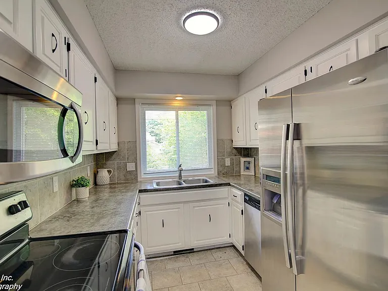 10475 Ruggles Plz — Photo 4