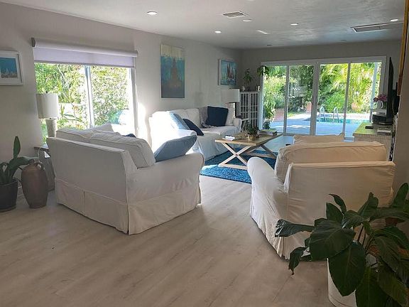 living room with pool view