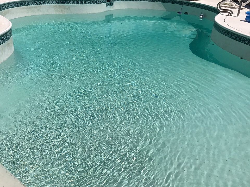 Huge pool with diving board