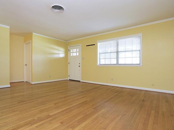 View of living room toward front door.