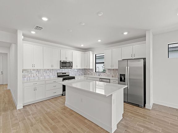 Chef-inspired kitchen with designer finishes