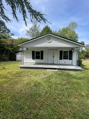 1209 Hilltop Dr NE Photo 1