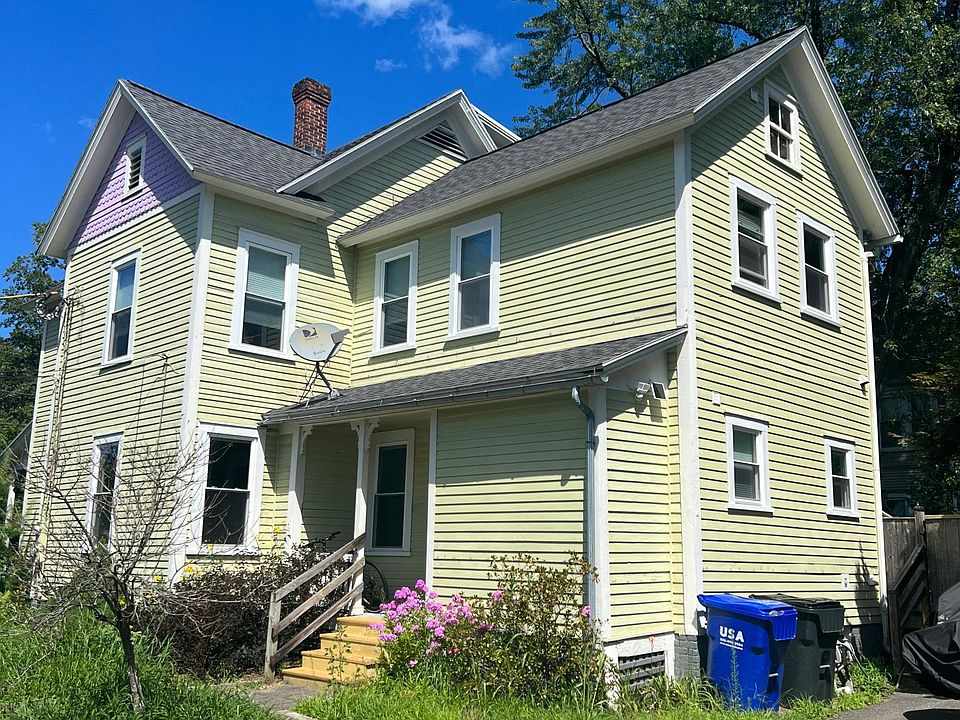 View of building exterior and driveway from Massasoit Street.
