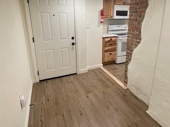 Exit Door with Kitchen entrance to the right