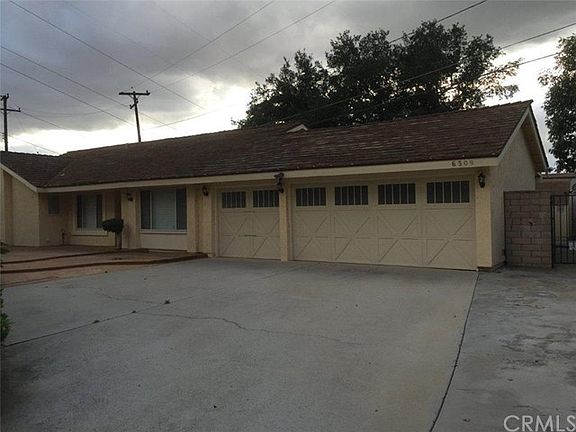 Three Car Garage and spacious front yard