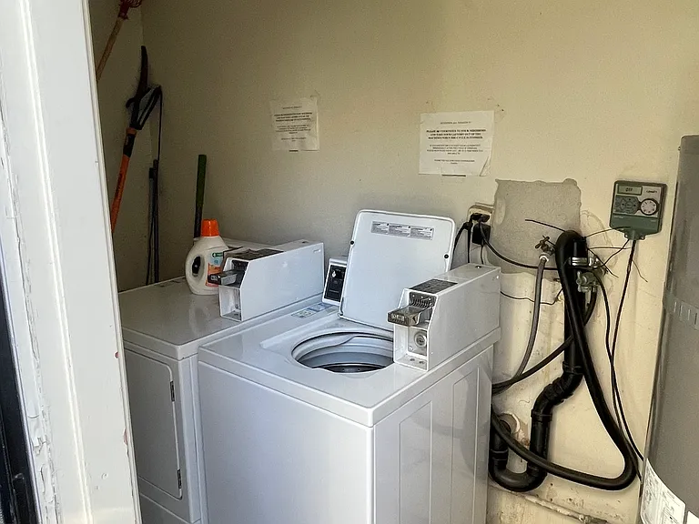 One washer/dryer Coin or card operated