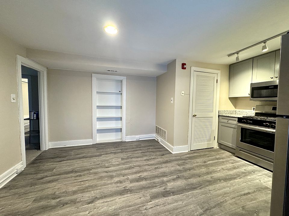 Washer and dryer located just off kitchen in utility closet.