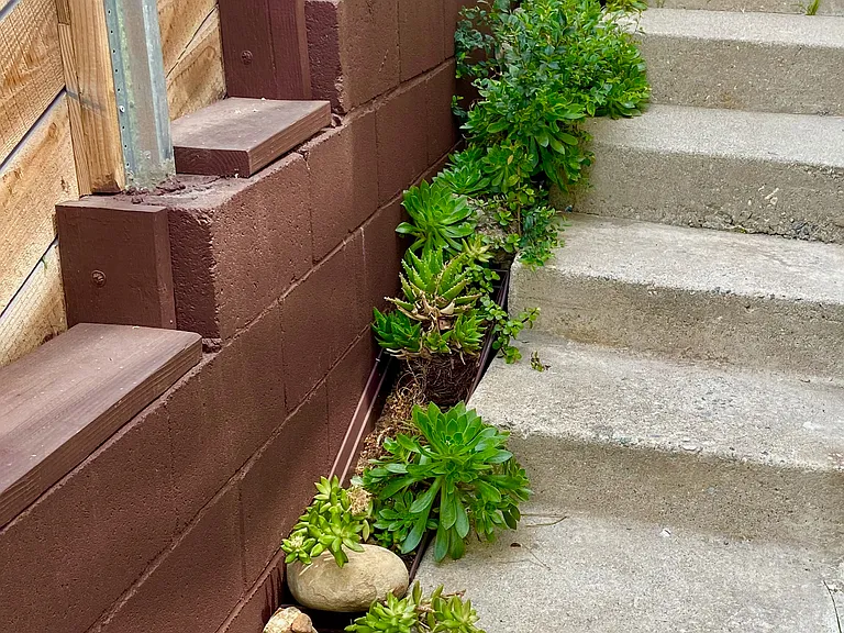 Side stairs leading to the private deck.