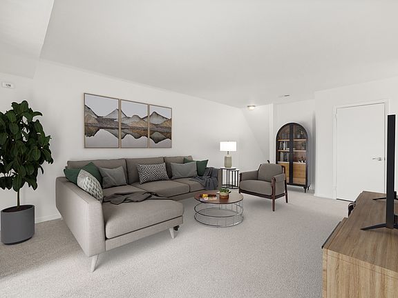Spacious Living Room (shown here with model furniture and decor)