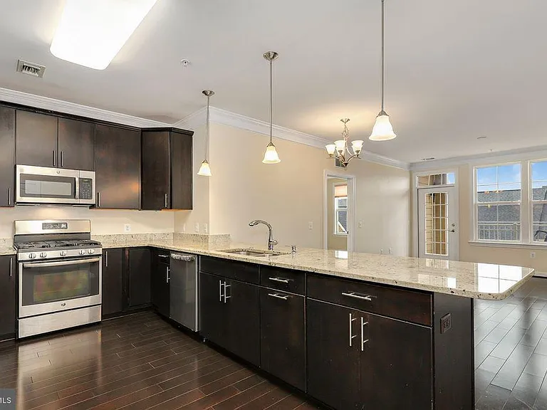 13722 Neil Armstrong Ave #406 — Photo 1