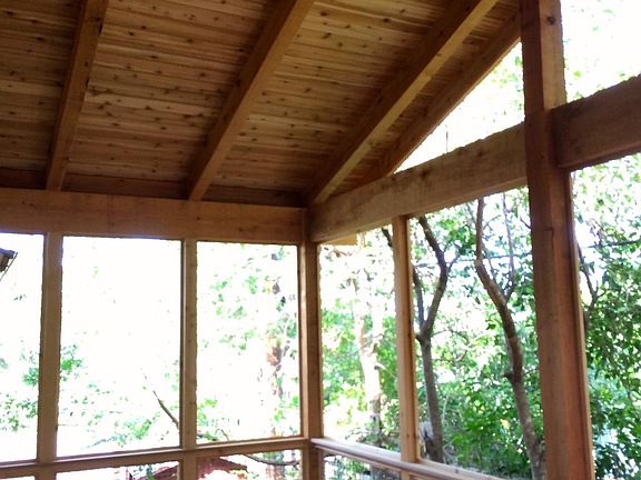 Exposed cedar porch with Ipe hardwood deck