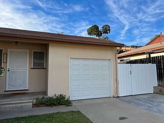 One car garage and side gate access to backyard.