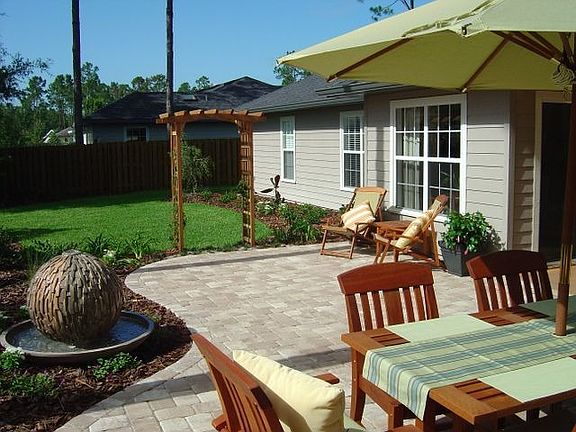 Professionally Landscaped Back Yard with Fountain