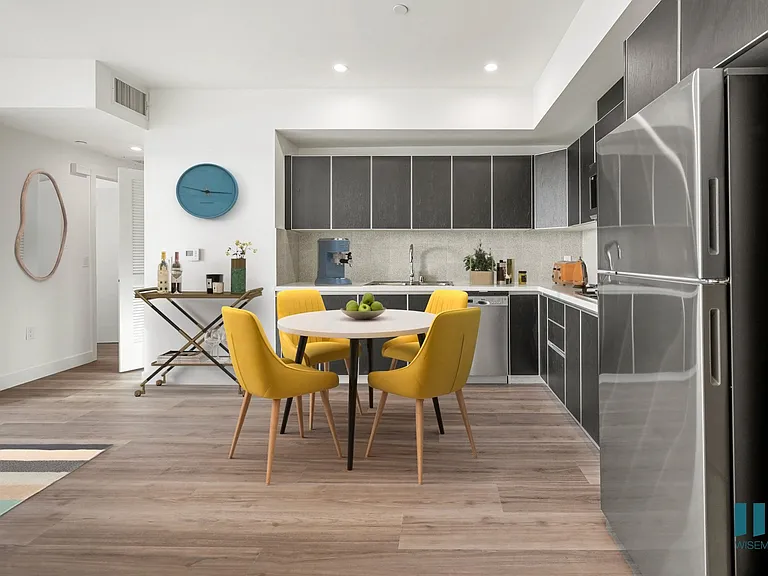 Open-Concept Kitchen with Stainless-Steel Refrigerator, Dishwasher, Stove Range, and Microwave Oven - Maple Floor Plan