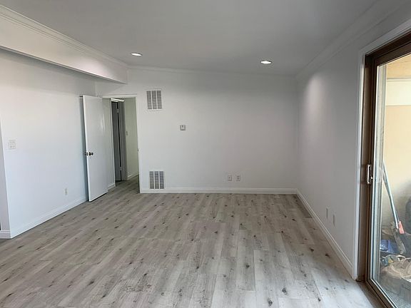 Huge beautiful ocean view open concept living room with high ceilings opens onto private deck with amazing views. This opens onto your spacious dining area and gourmet kitchen.