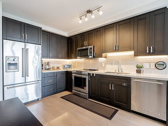 4th image of 11967 80th Ave #3206