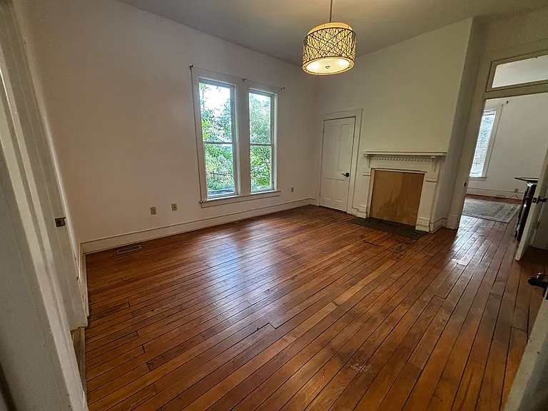 Bedroom #1 with fireplace, two closets and on-suite bathroom with shower and tub.