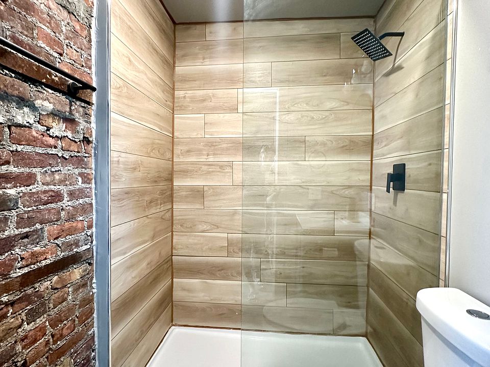 Glass shower with rain shower head