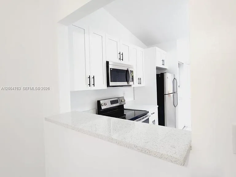 6960 NW 174th Ter #706 — Photo 8